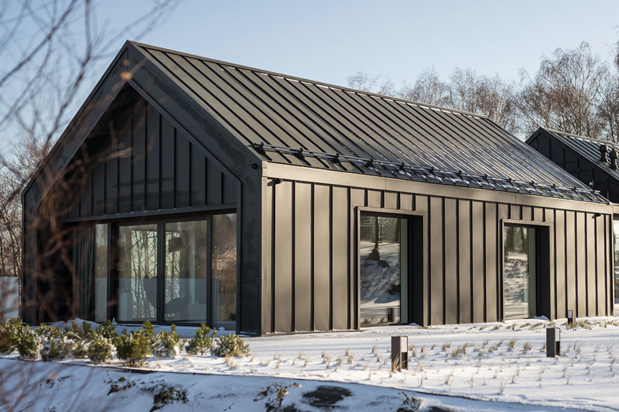 House in the Mountains – Hangulatos otthon GreenCoat®t tető- és homlokzatburkolattal